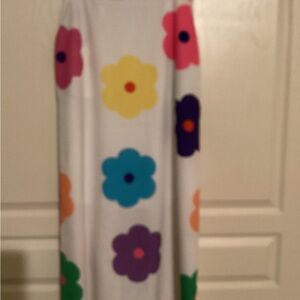 White skirt with bold colorful flowers